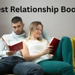 Couple sitting together on a sofa, each reading a relationship book